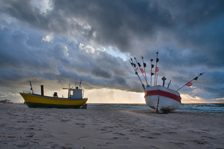 Fishing boat on the beach of the Polish Baltic coast near Rewalの写真素材