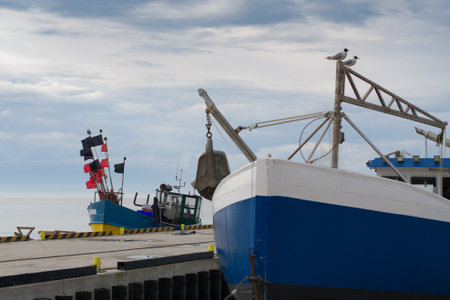 Fishing boat on the beach of the Polish Baltic coast near Niechorzeの写真素材