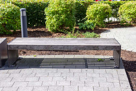 Old vintage park bench in a friendly and peaceful atmosphere.