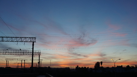 sunset at the train stop with beautiful deep blue sky and red clouds. Wideの写真素材