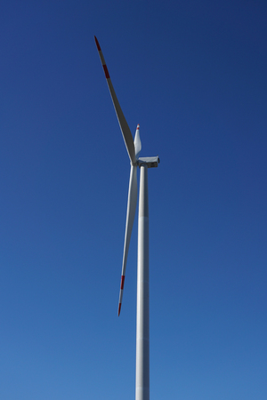 Eco power, wind turbines with blue sky. wind turbine for alternative electricity.renewable electric farm with sustainable eco-friendly technology using wind energy rotation for wind turbines renewableの写真素材