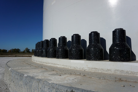 New wind power plant stands on the foundationの写真素材