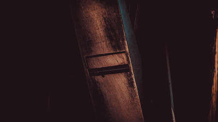 Wood tool on dark backgroundの写真素材
