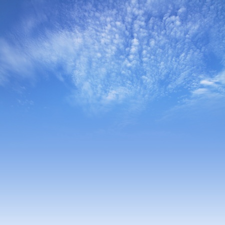 beautiful blue sky background with cloudsの写真素材