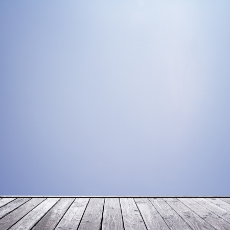wood floor and clear blue sky backgroundの写真素材