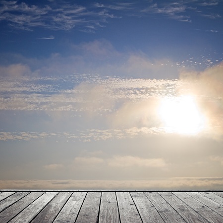beautiful sunset sky and wood floorの写真素材