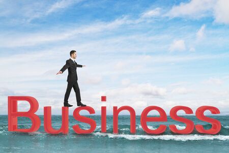 businessman in suit walking on text businessの写真素材