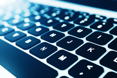 Close up of modern laptop black keyboard