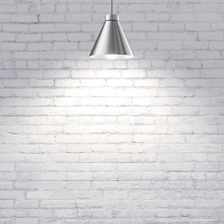 white brick wall with ceiling lampの写真素材