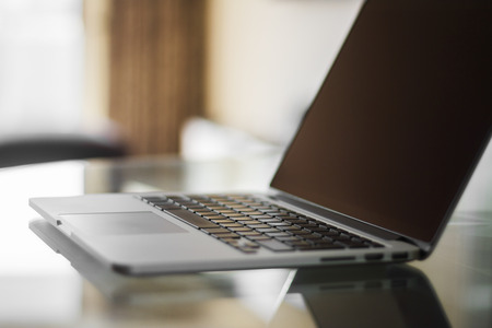 modern laptop at sunset, shallow depth of fieldの写真素材