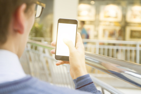 man with blank cell phone, close up
