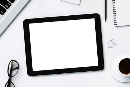 Blank white digital tablet and accessoriesの写真素材