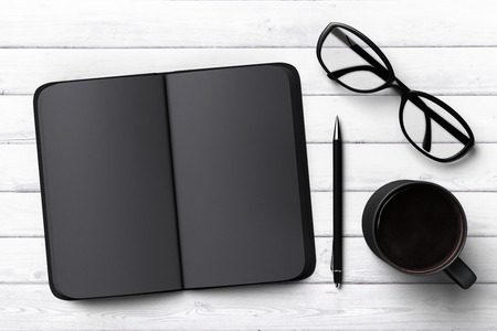 black diary, cup of coffee and glasses, mock upの写真素材