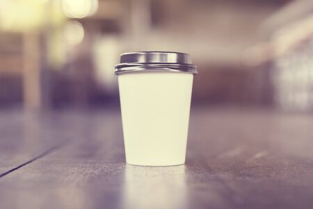 Cup of coffee to go, vintage photo effectの写真素材