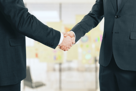 Business partners shake handsの写真素材