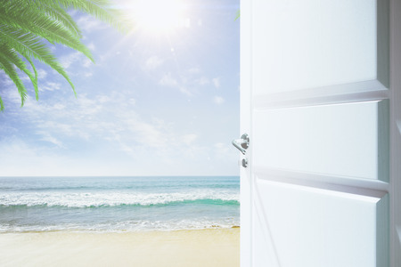 Door to a heaven with a beach and oceanの写真素材