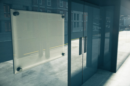 Blank glassy signboard on glassy wall of building, mock up, 3D renderの写真素材