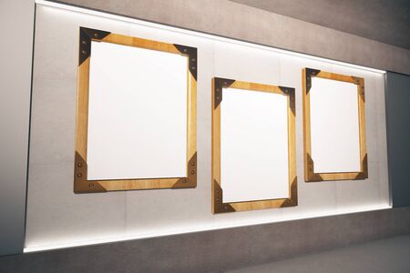 Blank wooden picture frames on beige wall in empty room, mock up, 3D Render