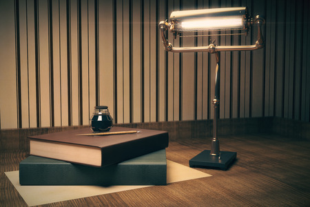 Two books with ink-pot on top and a lamp on wooden table. 3D Renderの写真素材