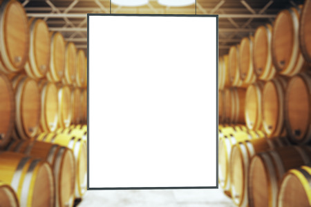 Blank picture frame between barrel stacks in winery. Mock up, 3D Renderの写真素材