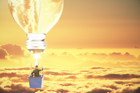 Idea concept with lightbulb airballon and businessman in yellow skies. 3D Renderの写真素材