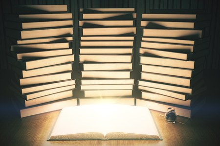 Stacks of closed books around illuminated open book. 3D Renderの写真素材