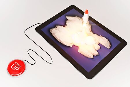 Start up concept with red button and abstract rocket launching from pad screen on light grey...