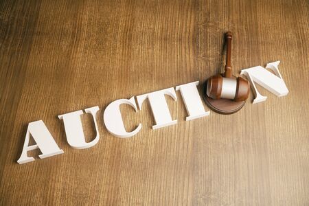 Top view of auction gavel on wooden desktopの写真素材