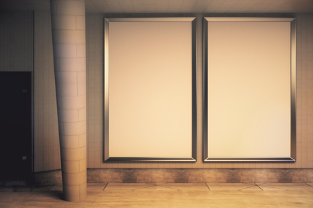 Concrete exterior with door, column and empty ad posters at night. Mock up, 3D Renderingの写真素材