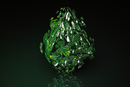 Abstract broken green glass figure on dark background with reflection. 3D Renderingの写真素材