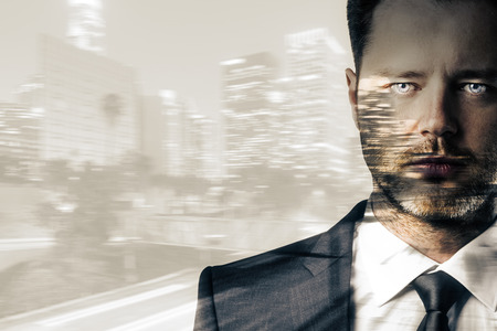 Portrait of handsome young man on abstract night city background with copy space. Double exposureの写真素材