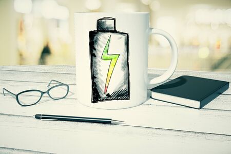 Coffee cup with creative battery sketch placed on white plank desktop with glasses, notepad and pen. 3D Renderingの写真素材