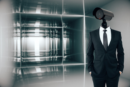 Businessman with CCTV camera instead of head.の写真素材
