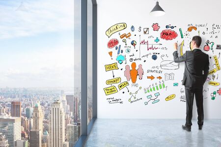 Businessman drawing creative business sketch in modern room with city view. 3D Renderingの写真素材