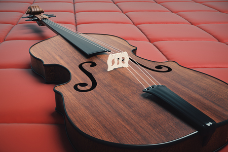 Side view of wooden violin on red leather background. Music concept. 3D Renderingの写真素材