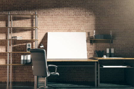 Close up of hipster workplace with empty whiteboard on red brick wall background. Mock up, 3D...