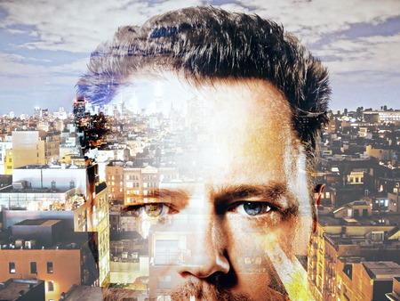 Abstract image of businessman on city background. Double exposureの写真素材