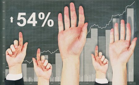 Raised up hands on chalkboard with upward graph background. Vote concept