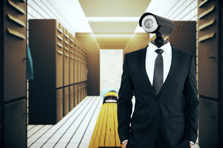 CCTV headed man in new gym. Supervision concept. 3D Renderingの写真素材