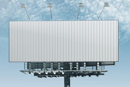 Front view of empty billboard on bright blue sky background. Advertisement concept. 3D Renderingの写真素材
