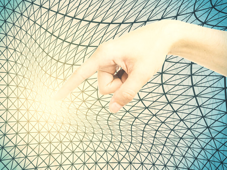 Hand pointing at abstract light grid net. 3D Renderingの写真素材