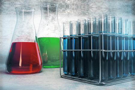 Colorful laboratory glassware on concrete texture. Scientific research, medicine, flask tubes. 3D...