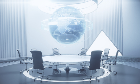 Abstract meeting room with glowing business globe hologram above conference table. Global business and communication concept. 3D Rendering の写真素材