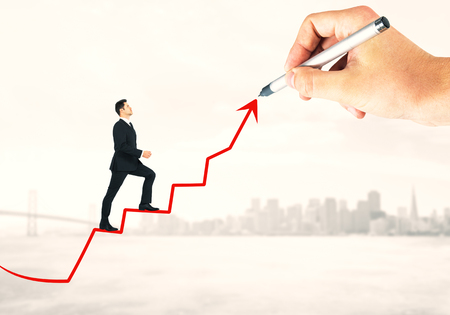 Businessman climbing abstract ladder arrow drawn by hand on light city background. Success and forward concept の写真素材