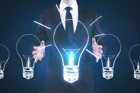 Hand holding glowing lamp. Idea and opportunity. 3D Rendering の写真素材