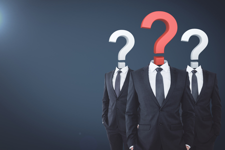 Question mark sketch headed businessmen on grey background with copy space. Confusion and teamwork concept の写真素材