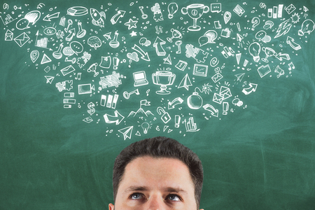 Leadership and solution concept. Abstract image of businessman with creative business sketchの写真素材