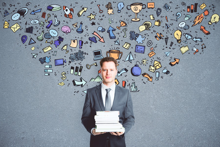 Leadership and education concept. Abstract image of businessman with creative business sketchの写真素材