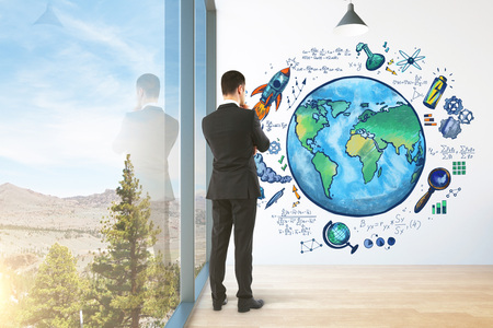 Businessperson looking at creative global sketch in modern interior with daylight and window view. Worldwide, science and eco concept. 3D Rendering の写真素材