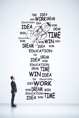 start up concept with businessman looking on words and rocket on white wall. 3D renderの写真素材